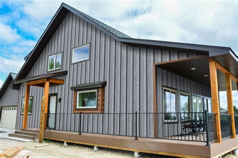 ranch house with gray siding & white metal roofing|small ranch siding ideas.